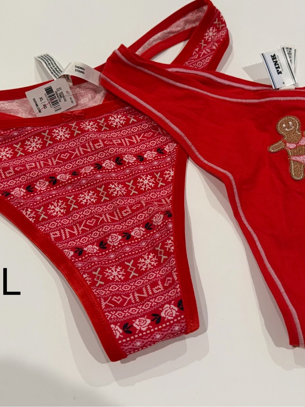 VS Pink pair of Holiday themed thongs